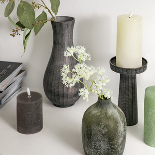 A selection of vases and modern matching candles
